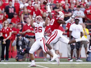 Sophomore cornerback Josh Kalu breaks up a pass against Wisconsin. (Photo Courtesy Nate Olsen/Nebraska Communications)