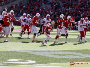 Jack Hoffman sprints down the sideline on his 69-yard scoring run - Courtesy: NU Media Relations