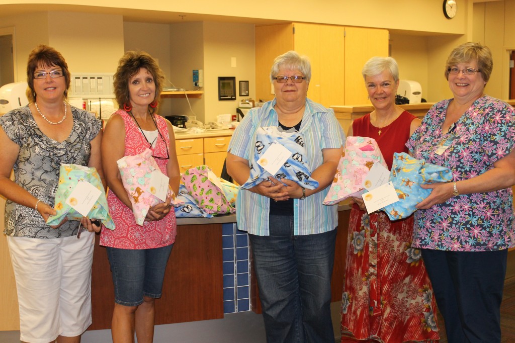 Immanuel Lutheran Church Donation Pictured from left to right, Stephanie Cogdill, Karen Claussen-Smith, Junice Dagen, Pastor Ann Sundberg and Rose Fryda.